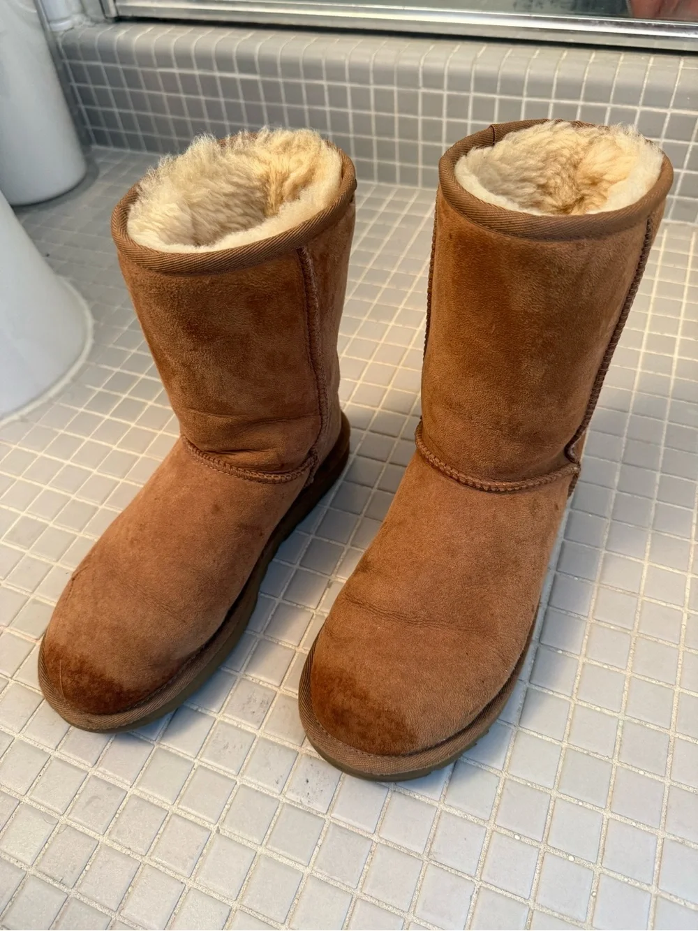 Used UGG Classic Ultra Mini Boots in Chestnut, size 6.